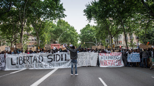 Demo against deportation of street vendors, Barcelona.